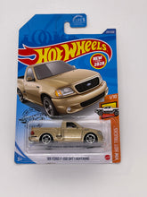 Load image into Gallery viewer, Hot Wheels ‘99 Ford F-150 SVT Lighting
