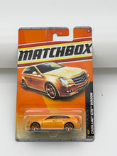 Load image into Gallery viewer, Matchbox Cadillac CTS Wagon VIP (Orange)
